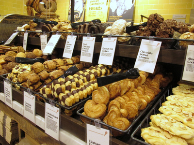 <p>A front counter was filled with cookies as shoppers poured into the new Whole Foods on East 57th Street on Thursday, Aug. 23, 2012.</p>
