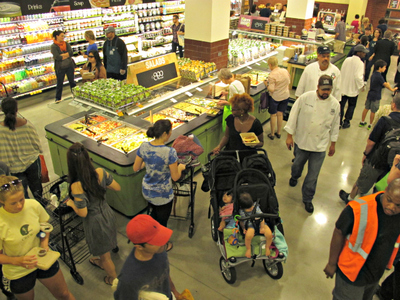 <p>Shoppers swarmed the new Whole Foods on East 57th Street, which opened on Thursday, Aug. 23, 2012.</p>
