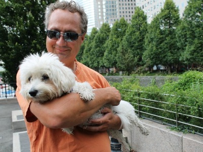 <p>David Caporale, a Gateway Plaza resident, with his 2-year-old Havanese, Luna.</p>
