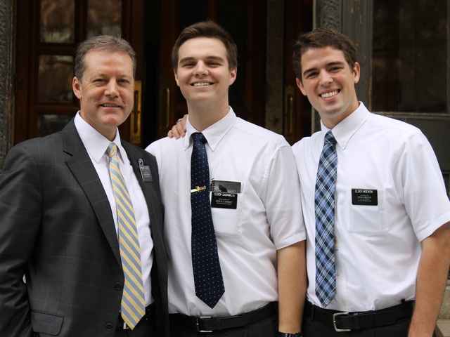 Kevin Calderwood, President of the area's mission, stood outside the Williamsburg church with missionaries Marc Cabanilla and Elder McEwen.