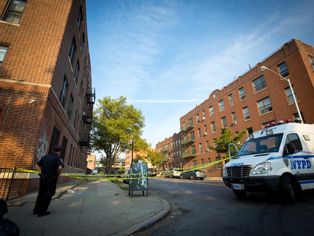 The intersection of Tapscott Street and Blake Avenue, where a 13-year-old boy was shot on August 24, 2012.