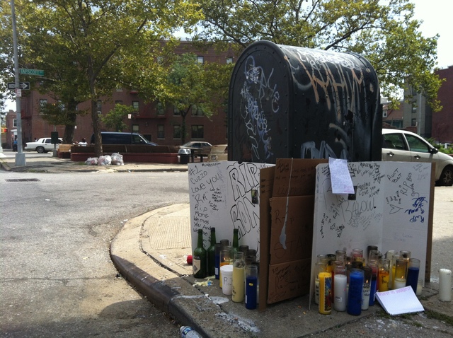 A shrine on August 25, 2012, a day after Ronald Wallace, 13, was shot to death near Tapscott St. and Blake Ave. in Brownsville, Brooklyn.