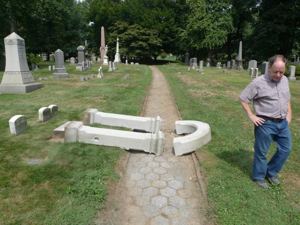 Vandals knocked over and shattered this arch at Green-Wood Cemetery in August 2012.