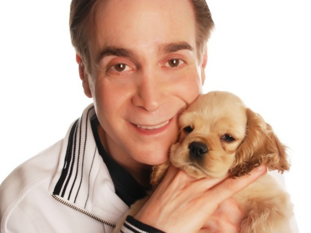 <p>Glenn Plaskin, president of the Gateway Plaza Tenants Association, with his dog, Lucy.</p>
