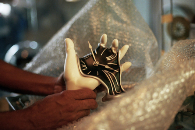 Sebastian Laws opens a Salvador Dali-inspired clock at his shop on the Upper East Side.