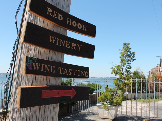 A sign points the way to the Red Hook Winery on Brooklyn's waterfront, the only winery listed on the Brooklyn Spirits Trail.