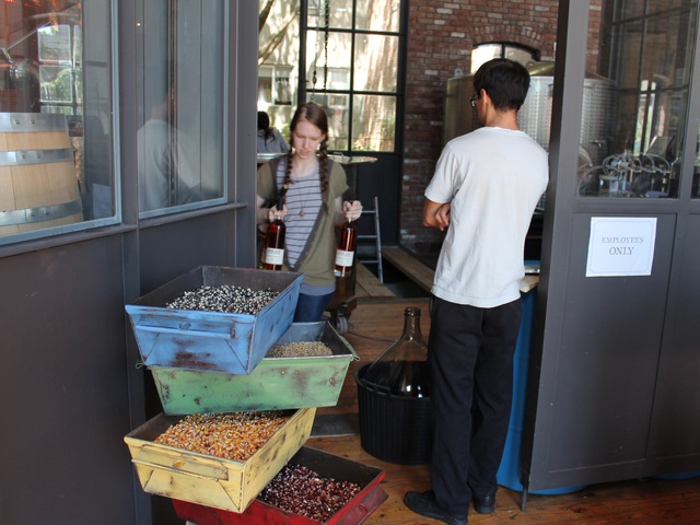 Cacao Prieto artistic director Michele Demis and distiller Layton Cutler watch over the distilling process.