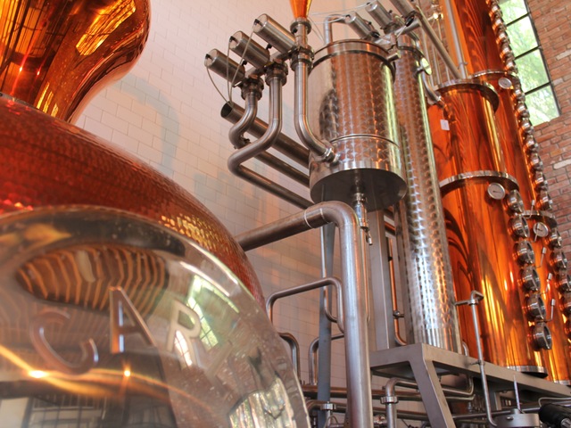 A tall copper still turns out liquor at Cacao Prieto.