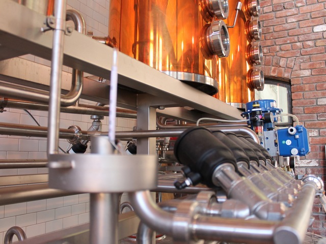 A tall copper still turns out liquor at Cacao Prieto.