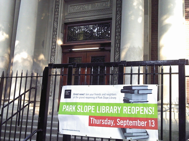 Banners were unfurled to announce that the Park Slope public library branch would reopen on Sept. 13, 2012.