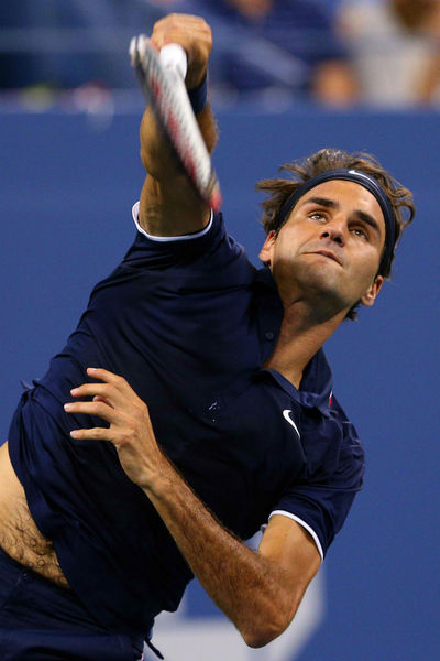 Roger Federer playing at the USTA National Tennis Center in Flushing, Queens, Thursday, August 30, 2012. 