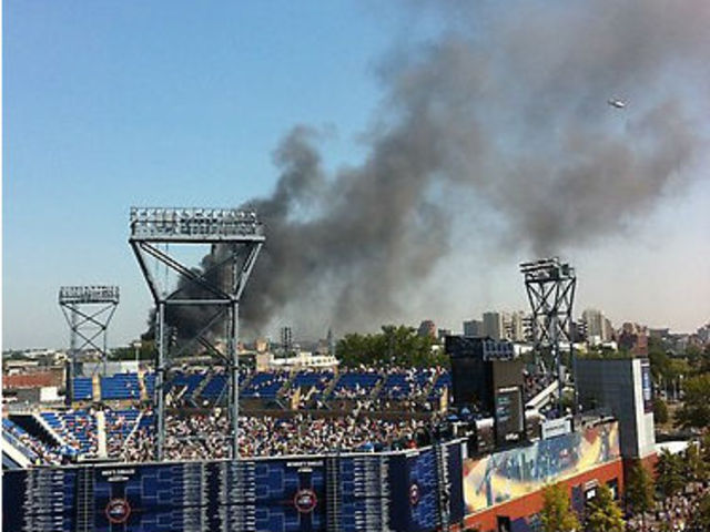 The fire, which broke out nearby around 11:30 in the morning, didn't disrupt the matches on Friday August 31, 2012. 