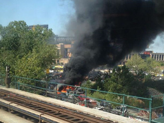 Cars were engulfed by fire in a junkyard near the U.S. Open and FDNY officials said the cause was unclear on Friday August 31, 2012. 