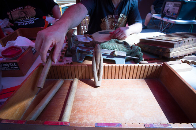 A triple-cigar roll, used by cigarmaker Pico Lopez, September 1, 2012 on Mulberry St.