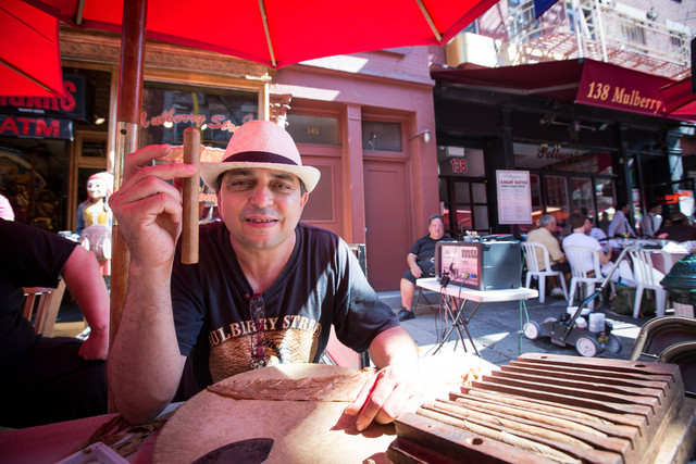 Pico Lopez shows a newly rolled cigar on September 1, 2012.