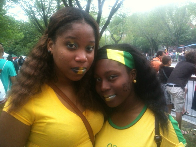 Trishana Hamilton, 16, and Ashley Lewis, 14, came to the parade to represent Jamaica, their lips painted in the colors of the Jamaican flag. 