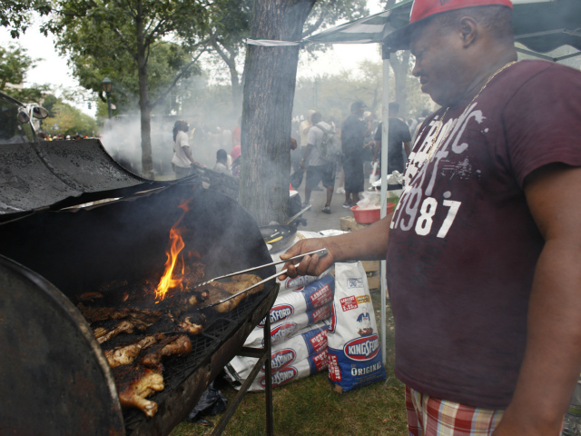 Cooking Jerk Chicken at the West Indian-American Day Parade along Eastern Parkway in Brooklyn. Sept. 3, 2012. 