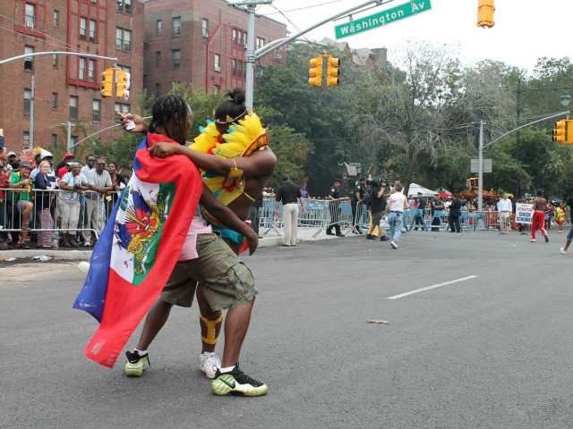 Parade participants dance in the middle of the street during the 2012 West Indian-American Day Parade. Sept. 3, 2012. 