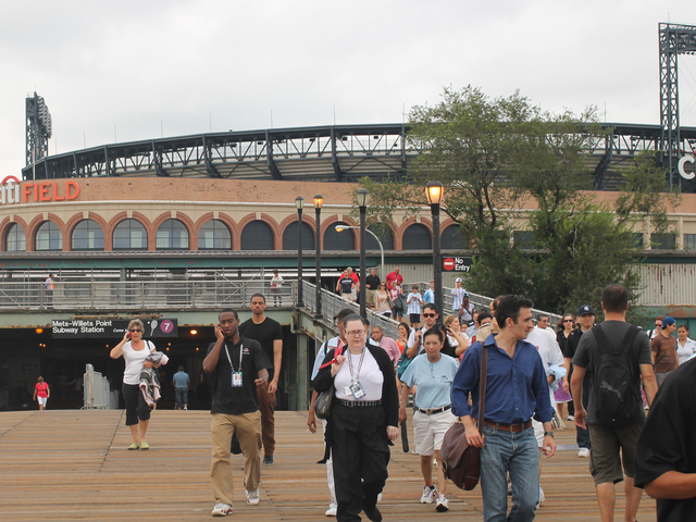 Fans exit the 7 train at Willets Point for the U.S. Open