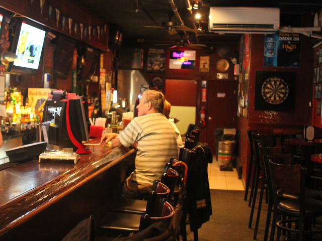 Business is slow at the Roosevelt Sports Bar, despite its location down the street from the U.S. Open.