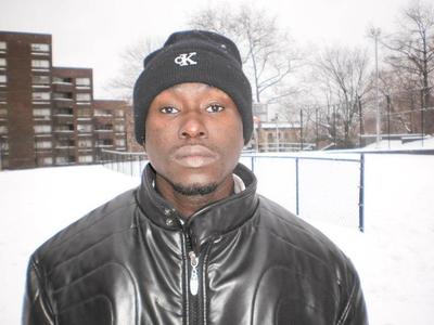 Lamin Sillah, a 28-year-old gas station attendant, was shot and killed in an apparent robbery in Belmont Tuesday night.