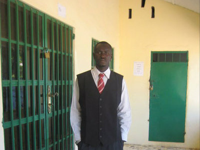 Lamin Sillah, a 28-year-old gas station attendant, was shot and killed in an apparent robbery in Belmont Tuesday night.