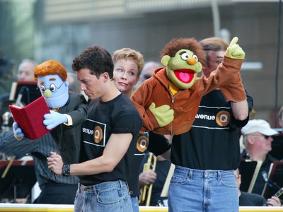 The cast of Avenue Q appears at the 12th Annual Broadway On Broadway free concert sponsored by Toys 'R' Us in Times Square Sept. 7, 2003 in New York City. 
