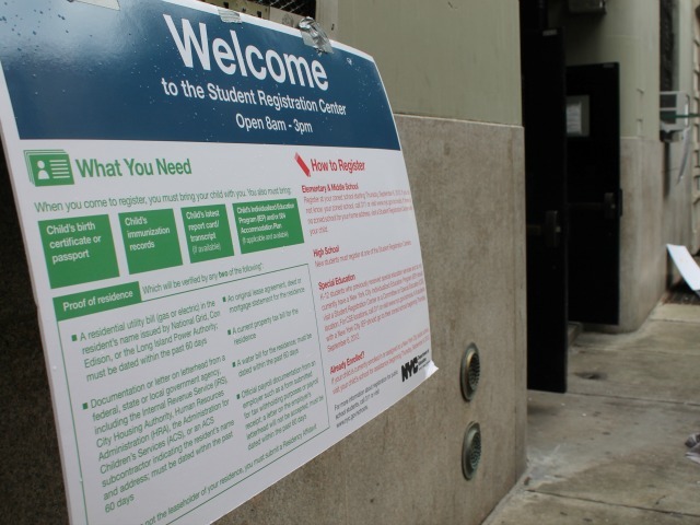 A poster outside the High School of Fashion Industries in Chelsea listed the documents families needed to bring to register for school Sept. 5, 2012. 