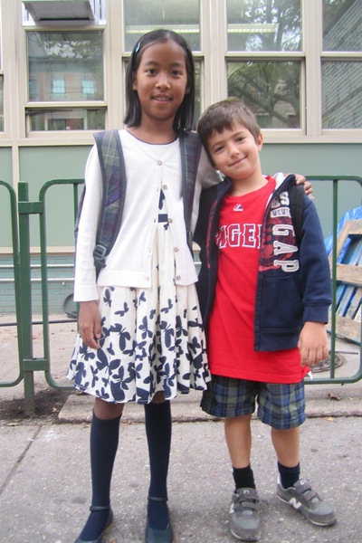Lydia Cresci, 8, chose a patterned dress for her first day of 4th grade at P.S. 41 in Greenwich Village Sept. 6, 2012. Her brother Nicholas, 6, chose a more casual look. 