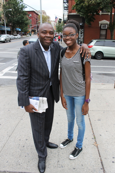 Dad Confrence Gbaje and daughter Tadafe Gbaje, 12, on their way to Tadafe's first day at Park Slope's M.S. 51. As a seventh grader, Tadafe said she was aiming for an "older, more stylish" look, so she wore a shirt from Forever 21.