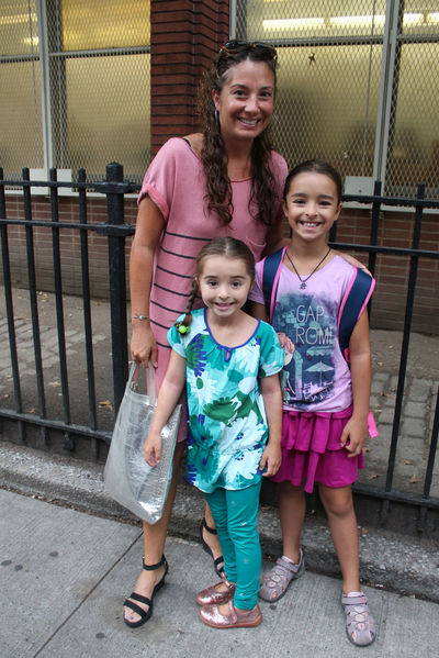 Upper West Sider Tina bought her cotton striped dress from a boutique and was in a hurry to make sure her daughters Emilia and Valentino got to P.S. 87 on time. 