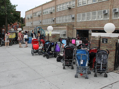Strollers wait for parents outside P.S. 321 on the first day of school in September 2012.