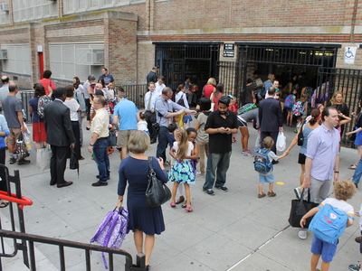 Morning drop-off was full of hugs and smiles as students returned to P.S. 321 in September 2012.