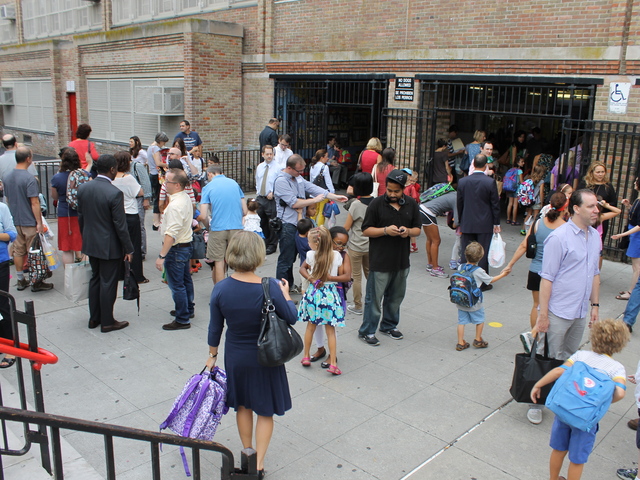 Morning drop-off was full of hugs and smiles as students returned to P.S. 321.