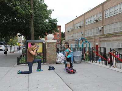 Dad Harold Einstein takes photos of Lux and Izzy Einstein outside P.S. 321 on the first day of school in September 2012.