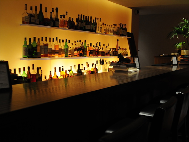 Many of the bars in the neighborhood offer cool, dark places to relax after the bright lights of the tents.