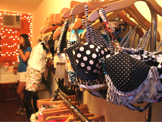 September 6 2012 - Christy Luo designs swimwear for her shop in the DeKalb Market. 