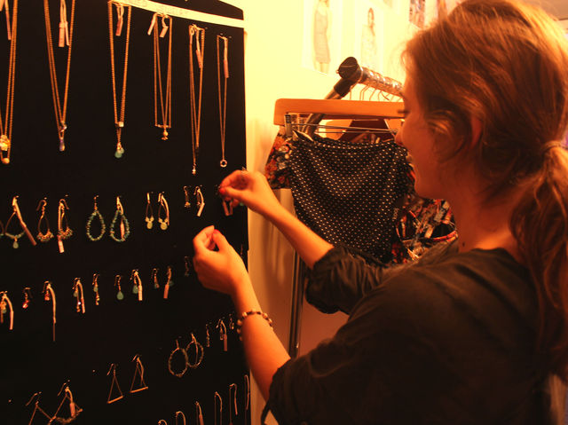 September 6 2012 - Christy Luo designs jewerly for her shop in the DeKalb Market. 