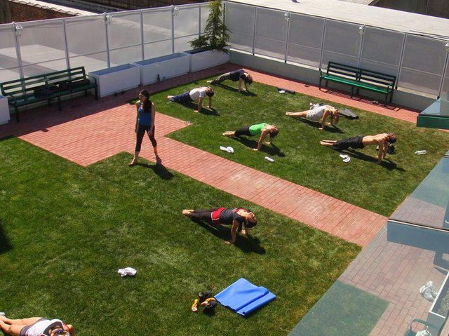 Students practiced yoga at Green Fitness Studio.