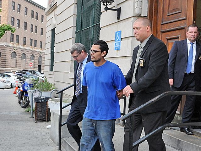 Ernesto Delgado, 28, leaves the 42nd Precinct in The Bronx.