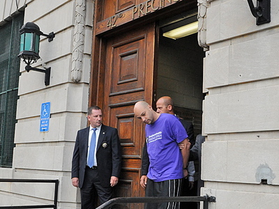 Shooting suspect Orlando Ramos outside the 42nd Precinct in The Bronx.