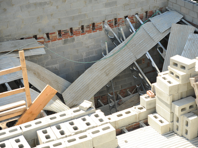 The top section of the building at 214 Carlton Avenue where one worker plunged to his death during a collapse on Monday September 10th, 2012.