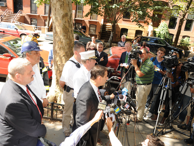 FDNY Deputy Assistant Chief James Leonard and Commissioner Robert LiMandri from the Department of Buildings address the media at the scene of a fatal building collapse on Monday September 10th, 2012.