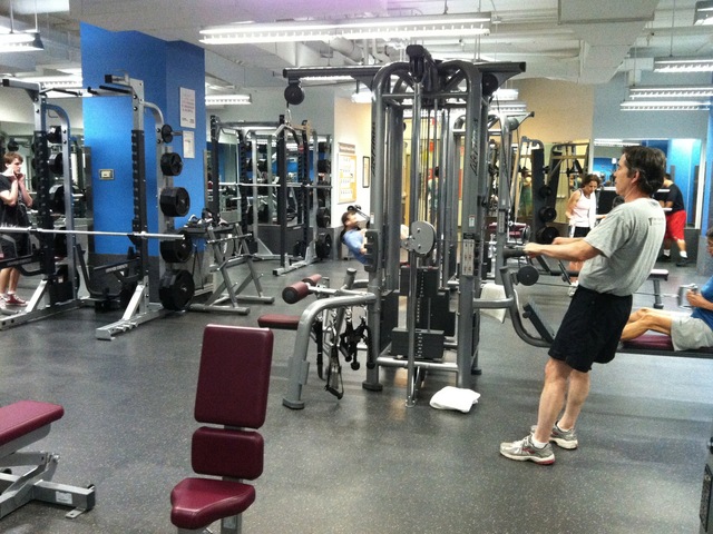 Members enjoy the new strength training center at the McBurney YMCA.