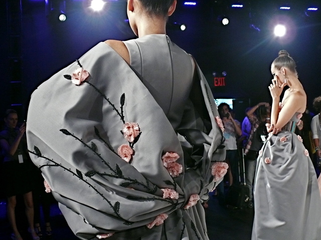 Cennamo's gray gown with cherry blossom embroidery and oversize bow sleeves.