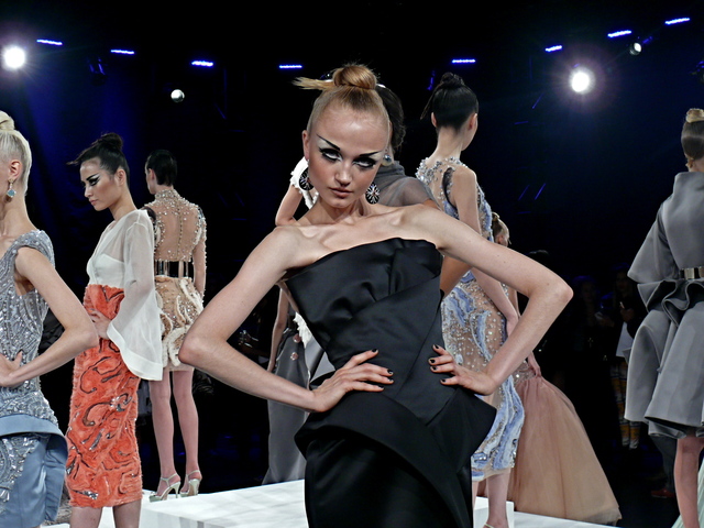 Cennamo's black strapless origami gown.
