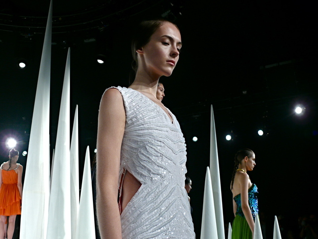 Mirano's white sequined mesh column gown.
