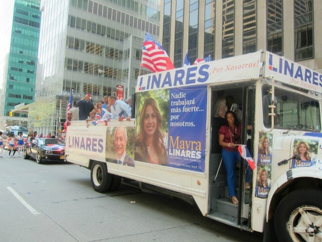 Mayra Linares and her father campaigned together on the same truck at the Dominican Parade.