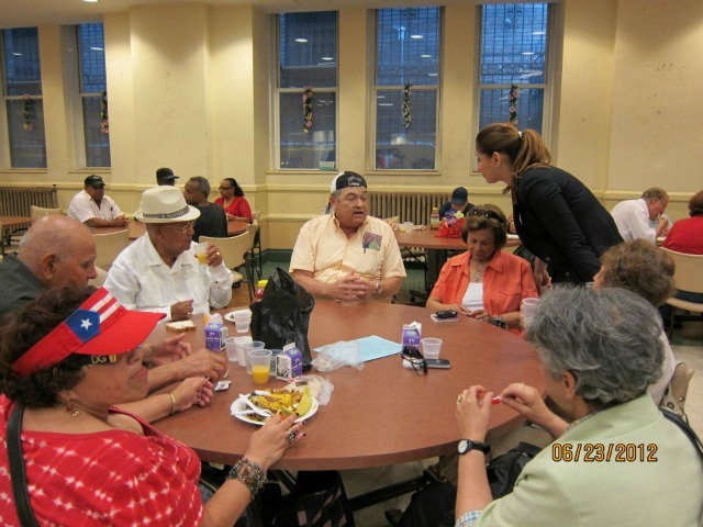 Mayra Linares greeted voters back in June.