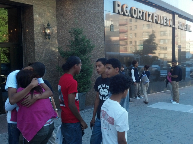 Mourners outside the funeral home where Cuevas' memorial service was held.